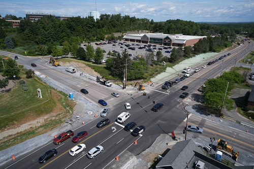 Crews conduct sidewalk prep at the U.S. 2/7 and Mountain View Drive intersection in Colchester, VT.
