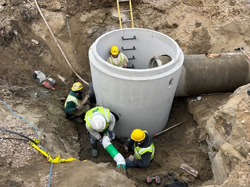 Crews install drainage infrastructure along U.S. 2/7 in Colchester, VT.