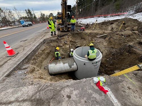 Crews install drainage infrastructure along U.S. 2/7 in Colchester, VT.