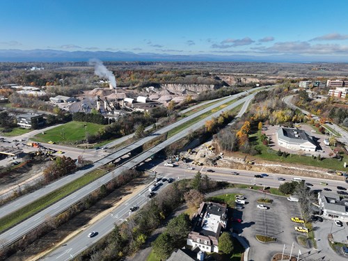 An aerial view of the I-89 Exit 16 interchange, where drainage work and intermittent blasting events continue to take place.