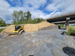 Crews completed the installation of the retaining wall along the west side of U.S. 2/7.