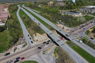 Aerial views of crews setting up the blasting mats that work to contain debris during blasting events.