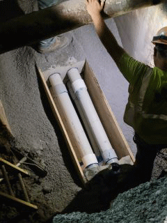 Crews continue working to install utility duct bank along U.S. 2/7.