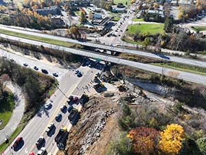 Aerial view of construction progress in October 2025. Drainage infrastructure installation along U.S. 2/7 and the I-89 southbound on-ramp. Blasting activities and ledge removal along U.S. 2/7 and the I-89 northbound on-ramp. 