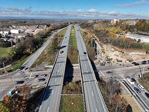 Aerial view of construction progress in October 2025. Blasting activities and ledge removal along U.S. 2/7 and the I-89 northbound on-ramp. 