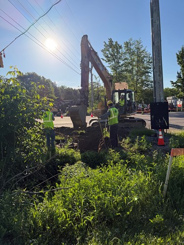 Crews conduct excavation for traffic signals at the U.S. 2/7 and Hercules Drive intersection.