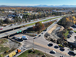 Aerial view of construction progress in October 2025. Drainage infrastructure installation along U.S. 2/7 and the I-89 southbound on-ramp. 