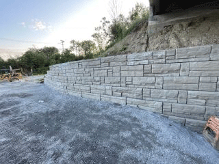 Crews continue constructing the retaining wall along the west side of U.S. 2/7 to allow for future pedestrian and bicycle facilities. 