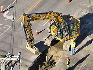 Aerial view of construction progress in November 2025. Drainage infrastructure installation along U.S. 2/7 between the I-89 southbound on-ramp and South Park Drive.