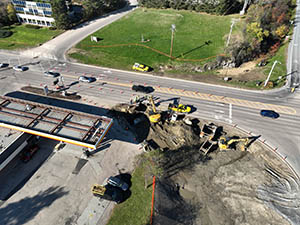 Aerial view of construction progress in October 2025. Drainage infrastructure installation along U.S. 2/7 and the I-89 southbound on-ramp. 