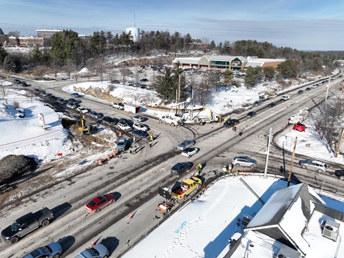Crews conduct traffic signal work at the intersection of U.S. 2/7 and Mountain View Drive in Colchester, VT.