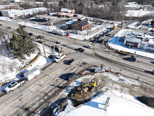 A December 2025 aerial view of traffic signal work at the U.S. 2/7 and Mountain View Drive intersection in Colchester, VT.