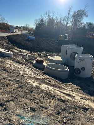 Crews continue to construct the drainage ponds along U.S. 2/7 and the I-89 southbound on-ramp.