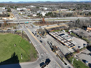 Aerial view of construction progress in November 2025. Drainage infrastructure installation along U.S. 2/7 between the I-89 southbound on-ramp and South Park Drive.