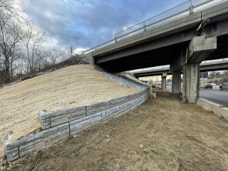 Work continues on the installation of the retaining wall along the east side of U.S. 2/7.