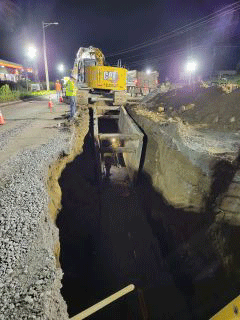 Crews continue working to install utility duct bank along U.S. 2/7.