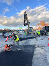 Patch paving on U.S. 2/7 near the Shell Gas Station after drainage infrastructure installation.