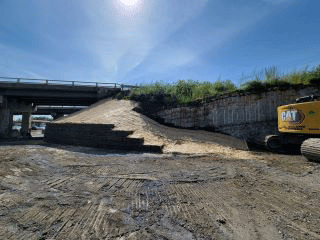 Crews completed the installation of the retaining wall along the west side of U.S. 2/7.