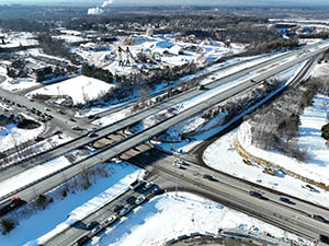 Aerial view of construction progress in December 2025. Drainage infrastructure installation along U.S. 2/7 between I-89 ramps and Mountain View Drive. 