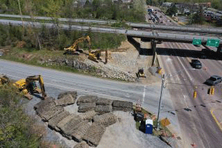 Aerial views of crews setting up the blasting mats that work to contain debris during blasting events.