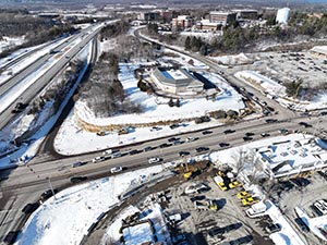 Aerial view of construction progress in December 2025. Retaining wall construction in The Lighthouse Restaurant parking lot along U.S. 2/7. 
