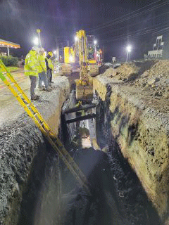 Crews continue working to install utility duct bank along U.S. 2/7.